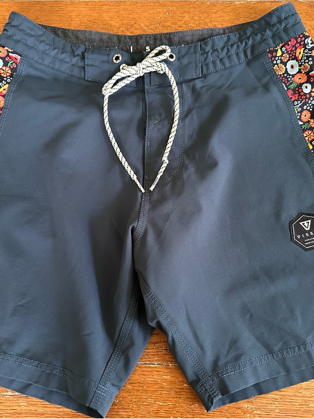 VISSLA Navy Board Shorts with Floral Side Panels size 29
